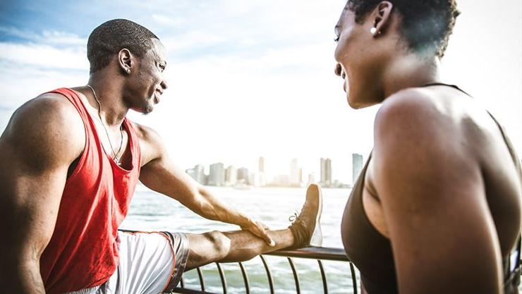 couple stretching outdoors